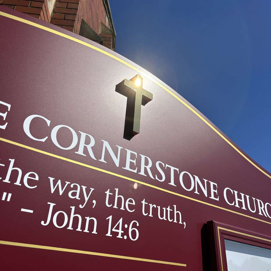 Church sign with Golden Cross
